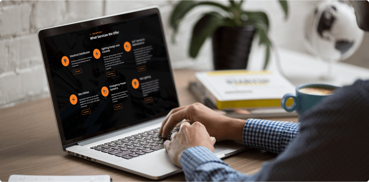 The services overview page open on a laptop at a desk